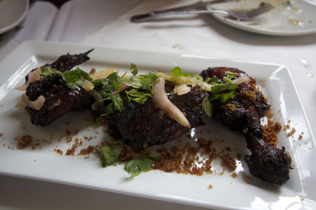 Coq au vin with candied bacon dust, red wine and celery salad at Rodin Restaurant. Photo ©Robert Bundy