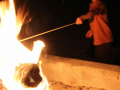 Roasting marshmellows and making s'mores on the beach.