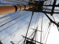 Standing under the shroud on the HMS Surprise at the San Diego Maritime Museum.