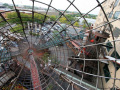 Crawling through a multistory complex of wire tunnels at The City Museum.